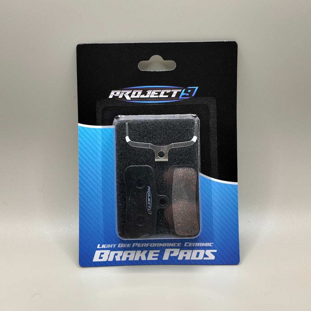 Project 9 designs brake pads for surron light bee ceramic compound